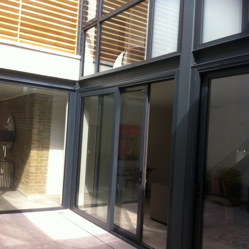 Anthracite aluminium sliding patio doors fitted in Chessington